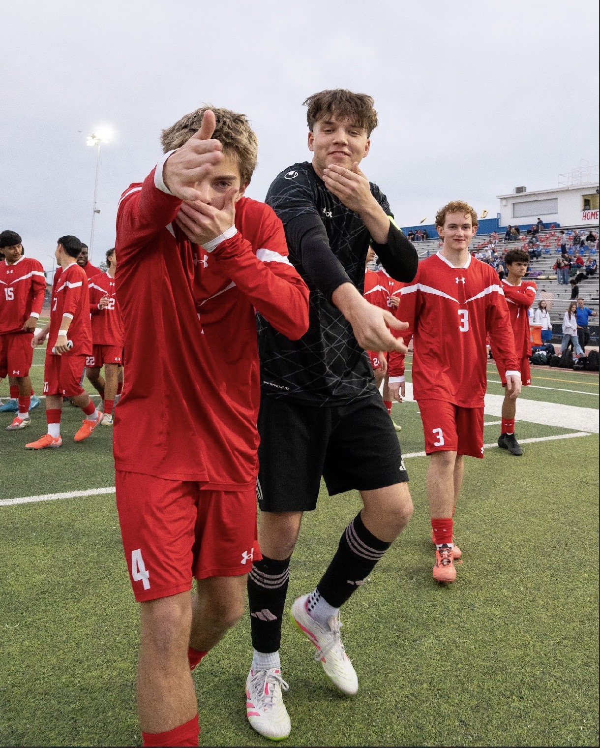 Mountain View boys soccer players celebrating after the match