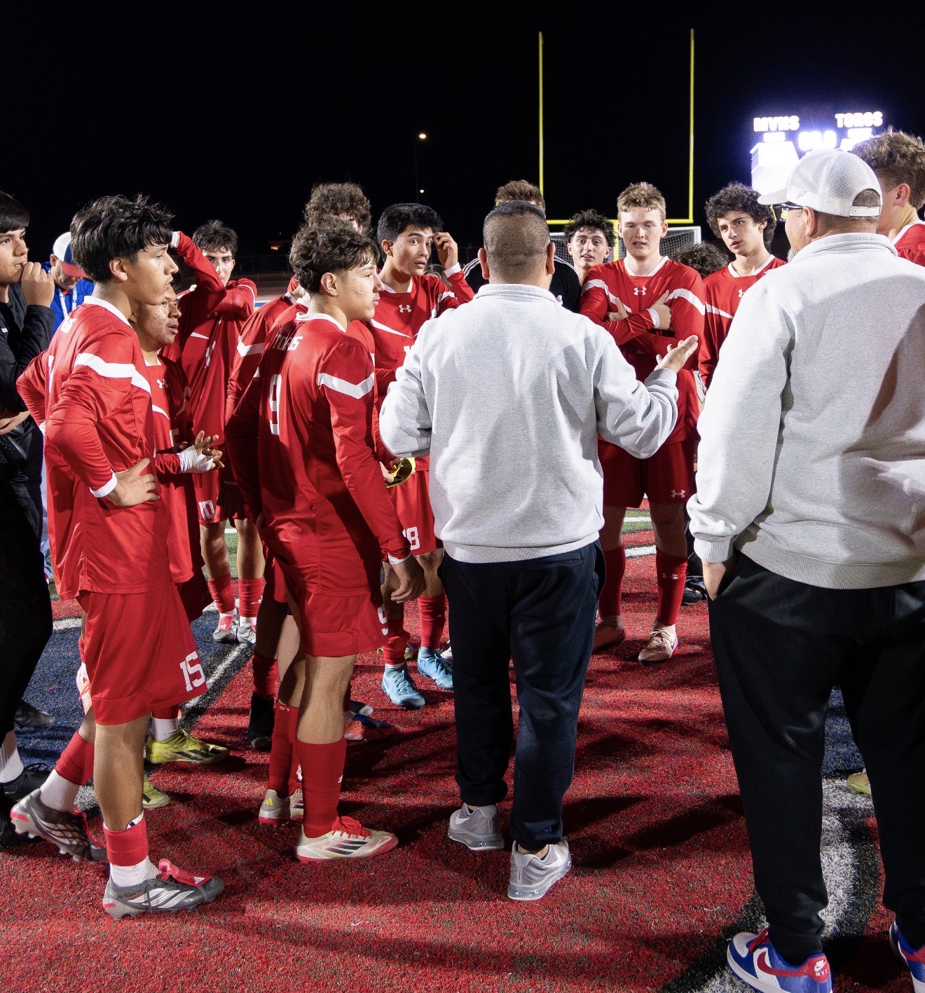 Mountain View boys soccer players and coaches together