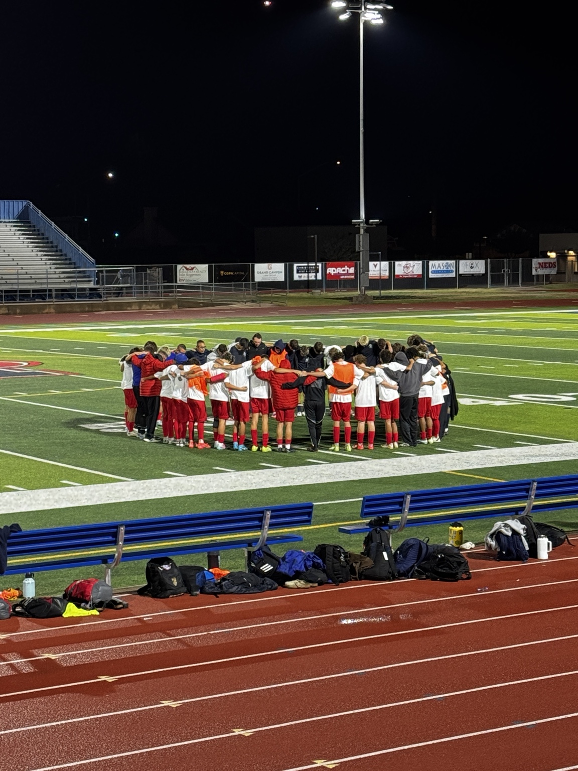 Mountain View boys soccer team huddling near midfield