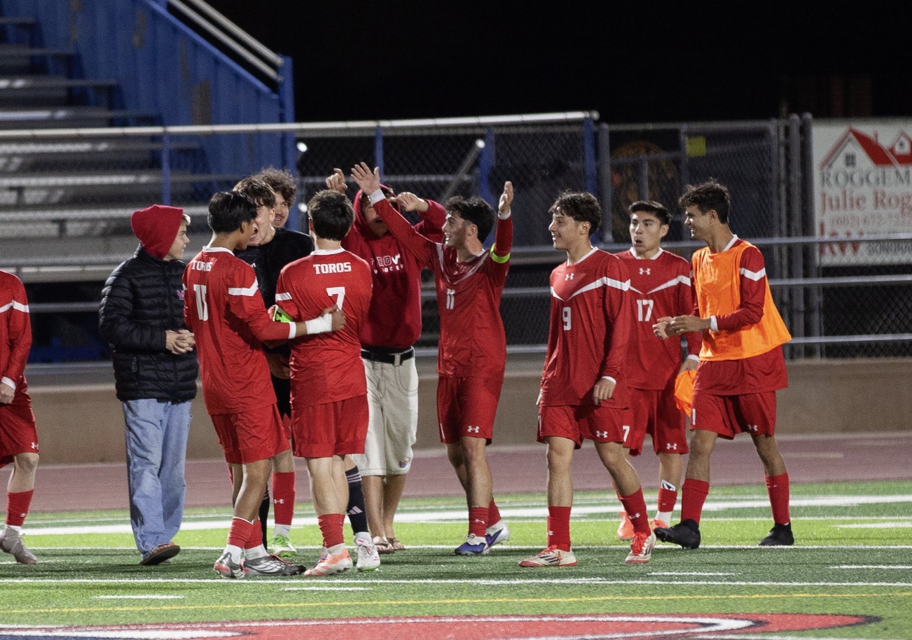 Mountain View boys soccer team gathered on the field