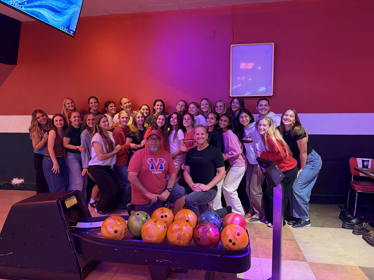 Mountain View girls soccer team and coaches at a bowling event
