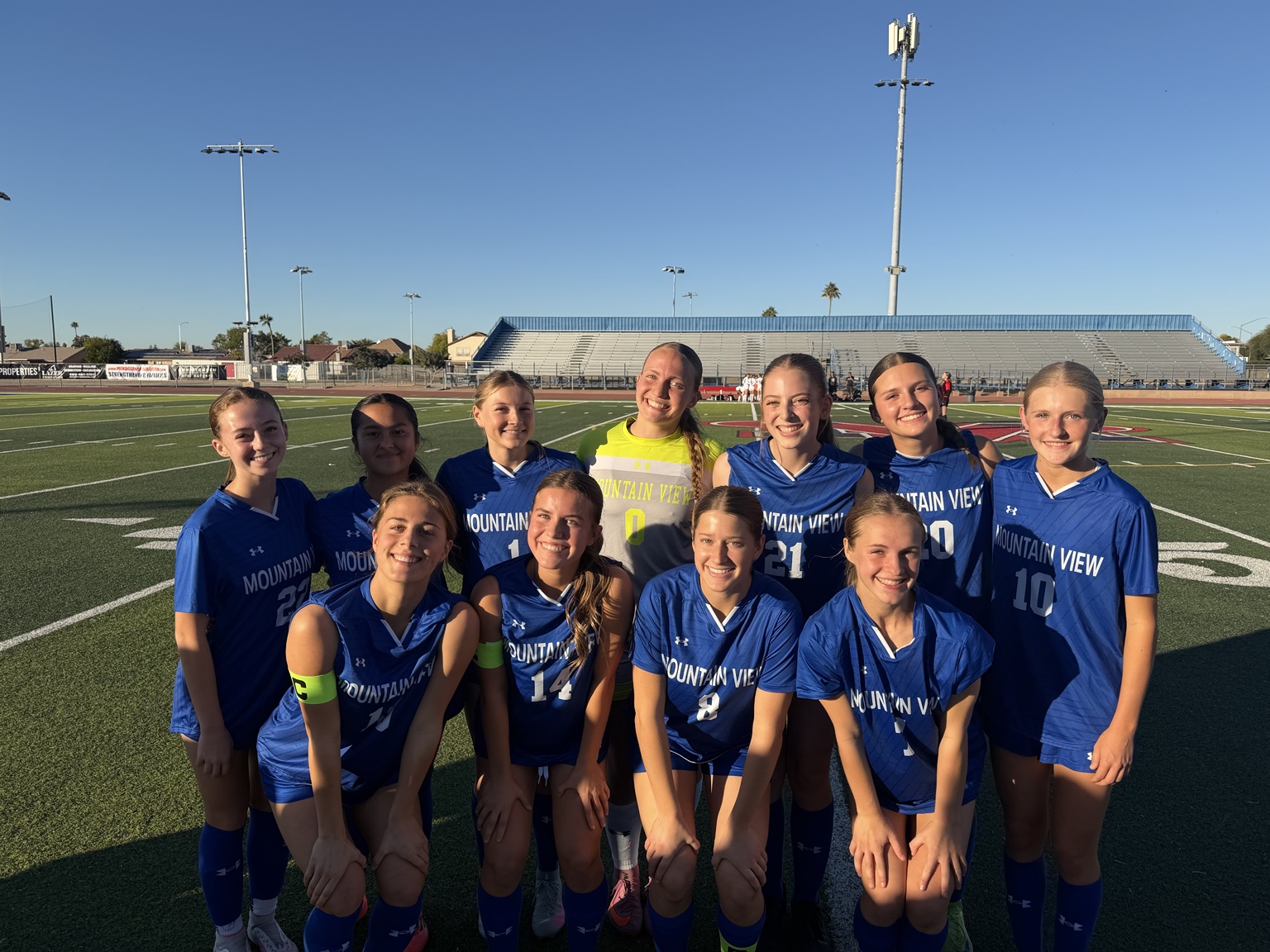 Mountain View girls soccer players together on a sunny match day
