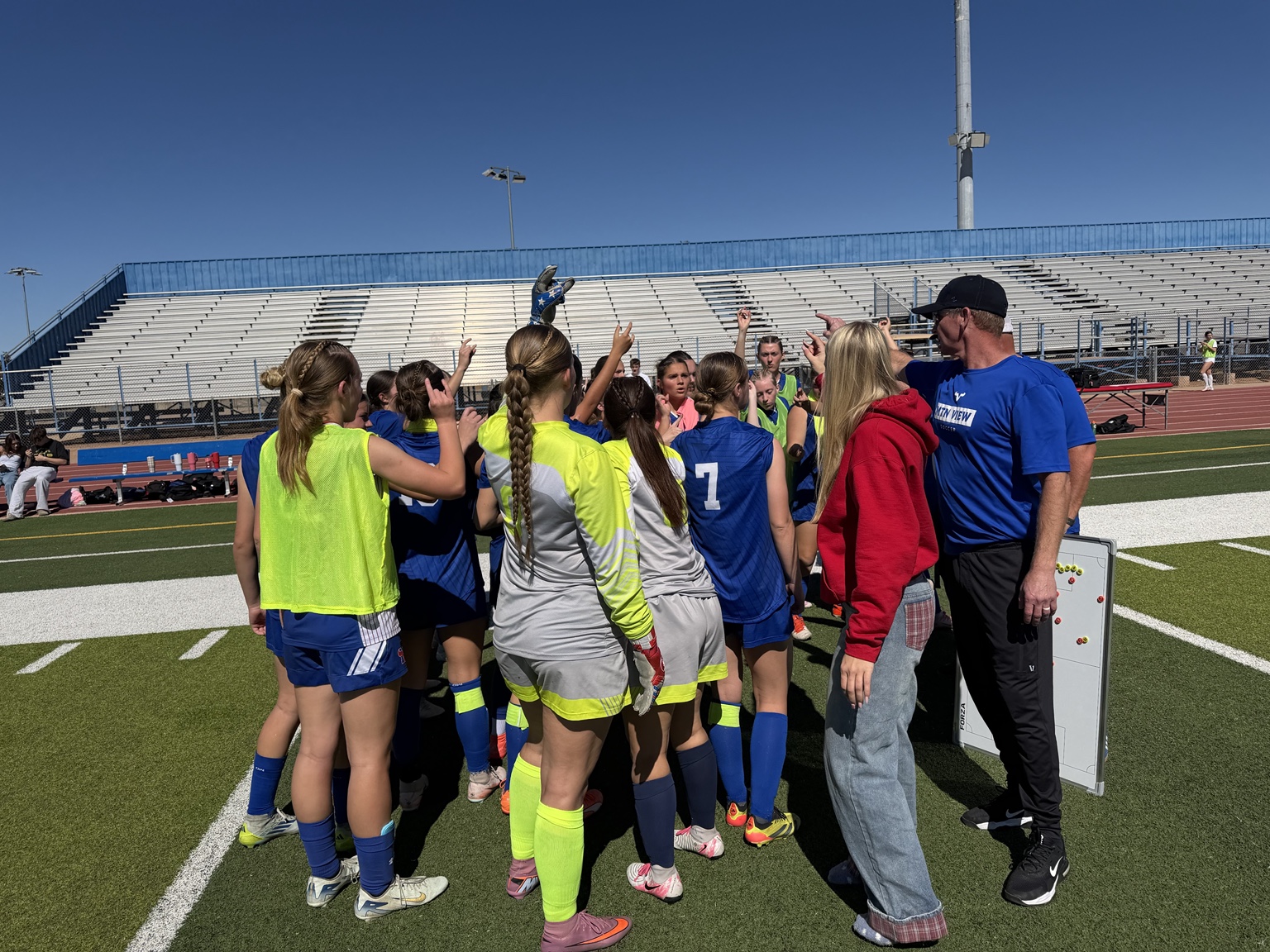 Mountain View girls soccer team together on the field